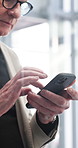 Phone, scrolling and businessman in office with communication, email or networking on mobile app. Professional, technology and male creative editor with cellphone for contact in workplace with flare.