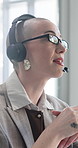 Call center, glasses or woman in agency with headset, contact us or investment advice in crm service. Specs, feedback or finance consultant with mic, online banking or assistance in loan support.