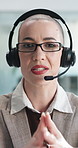 Face, woman and headset with video call in office for communication, advice and customer support. Female agent, discussion and webinar for online consultation, contact us and procedure for solution