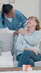 Caregiver, support and old woman in nursing home with laugh, funny story or bonding together for wellness. Happy, nurse and senior person in retirement center with joke, humor or help for healthcare.