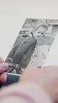 Hands, picture and memory for childhood in home for nostalgia, relax and senior person in retirement. Elderly woman, remember and vintage photograph with monochrome, girl and daydream at apartment