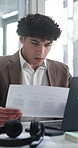 Documents, laptop or typing with man in office to review platform engagement on charts or graphs. Computer, infographic or paperwork with social media agent in workplace for traffic statistics