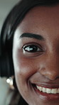 Face, closeup and woman with headset at call centre for customer service, online query and advice. Portrait, advisor and smile with mic, client support and crm representative for technical assistance