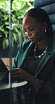Business, black woman and reading with tablet in cubicle for research, email client and real estate. Person, booth and digital to review schedule, price property and online inquiry for resale listing