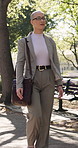 Walk, thinking or businesswoman in park with bag, mindfulness or inspiration in morning routine. Commuting, reflection or female person with briefcase, outdoor stroll or perspective at start of day.