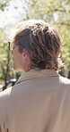 Walk, back or businessman in park with thinking, mindfulness or inspiration in morning travel. Commuting, reflection or employee with glasses, outdoor stroll or perspective at start of day.