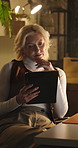 Creative, woman and thinking with tablet in office, magazine editor and working late for assignment. Newsroom, reflection and mature person with tech for article deadline, online and serious at night
