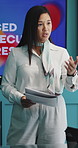 Documents, presentation and woman in meeting, planning for investment deal and feedback for profit. Person, financial advisor and stats report in workplace, talking and speaker for economy info