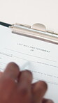 Document, hands and reading legal testament for last will, asset distribution and security. Closeup, person and review information on clipboard for compliance, estate planning or terms and conditions