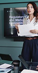 Woman, presentation and screen at office meeting for market, competition and documents at finance company. Mature person, speaker and tablet with fair trade, compliance and regulations at agency