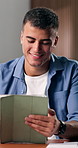 Tablet, happy and man on sofa in home with social media, texting or reading blog on app in living room. Relax, digital technology and male person online for chatting, networking or connectivity.