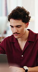 Man, typing and email in small business with laptop, online report and planning for creative project. Person, browsing and research in office with computer, company website and proposal for startup.