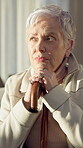 Thinking, cane and old woman with depression, remember memories and regret injury in nursing home. Walking stick, sad and senior person with disability, retirement or daydreaming for past reflection.