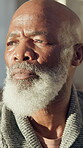 Thinking, sad and old man with depression, remember memories or pensioner with regret for retirement. Senior, black person and reflection in home with despair, flashback and daydream for past history