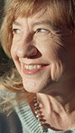 Mature, woman and thinking in home with smile, remember good memories and reflection on weekend break. Happy, female person and vision in house with wellness, peace and nostalgia for past history.