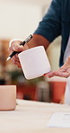Pottery, hands and cup in workshop for inspection, check inventory or quality control with document. Mug, ceramic or woman with paperwork for stock management, writing checklist or order information