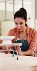 Pottery, series and woman with bowl in shop, inventory and picture on phone screen for social media. Multitasking, small business and mature person with tablet for ceramic order, happy and thinking