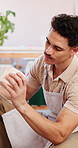 Clipboard, product and small business with man in boutique for retail commerce or sales. Inspection, stock and writing with store owner in craft shop for artistic, creative career or display