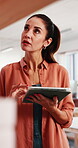 Woman, tablet and inspection in workshop with pottery, quality control or stock evaluation for shop. Mature, person and inventory management in small business with tech, clay review or check product.