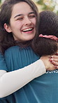 Happy, volunteer and women hug at summer camp for teamwork, collaboration and support. Nature, friends and counselor with embrace for help with outdoor program, youth facility and holiday club