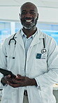 Face, smile and tablet with black man doctor in hospital for development, planning or research. App, healthcare and medical with mature African surgeon in clinic for insurance, records and wellness