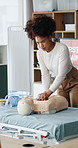 Woman, presentation and rescue with mannequin for cpr, teaching and gear at office. Person, coach and talk at workshop with dummy, chest compression or explain with first aid for emergency response