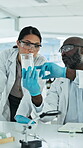 Science, beaker or people with discussion in lab, chemical reaction analysis or medical research experiment. Talking, team or scientist with solution observation for pharma study, trial sample or ppe