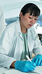 Woman, scientist and writing on notebook at lab for research, medical study and experiment results. Female person, checklist and notes for observation, investigation report and information on vaccine