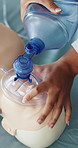 Hands, training or person with healthcare, ventilator for oxygen or demonstration. Teaching, instructor or help in emergency, dummy for lesson or first aid with medical service, learning or mannequin