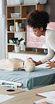 Woman, presentation and rescue with dummy for cpr, teaching and gear at office. Person, coach and talk at workshop with discussion, equipment or explain process with first aid for emergency response