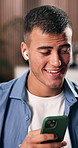 Dancing, phone and man with earphones in home, music subscription app and listening to online playlist. Smile, radio song and person with audio tech for streaming service, apartment or moving to beat