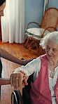 Nurse, stretching and old woman in retirement home with wheelchair, check arthritis and mobility. Caregiver, physiotherapy and elderly person with disability, injury rehabilitation or medical support