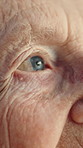 Thinking, closeup and eyes of senior woman with memory loss, dementia and reflection in retirement. Thoughtful, worry and elderly person with nostalgia, doubt and wondering with Alzheimers in home