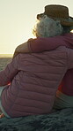 Beach, old women and hug in nature, bonding and happiness for reunion on summer holiday or adventure. Sunset, flare and elderly people with smile on vacation, friends and travel together on getaway