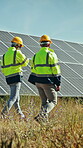 Solar panel, back or people on site with tablet, structure maintenance or inspection in project management. Teamwork, ppe or engineers with tech, grid progress or checklist in photovoltaic review.