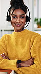 Happy woman, face and consultant with headset or confidence for online advice in office. Portrait, female person or agent with smile, mic or arms crossed for virtual assistance or help in call center