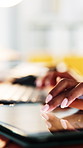 Hands, tablet and typing at office with computer for review, notes and report for feedback at tech startup. Person, software developer and space with application, pc or project management at agency