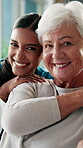 Nurse, face and hug with old woman in clinic, retirement and support for elderly patient or kindness. Caregiver, trust and bonding with senior person, embrace and happy for wellness and healthcare