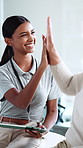 Physiotherapy, tablet and senior woman high five for rehabilitation, wellness and medical service. Healthcare, happy and physical therapist on tech with patient for recovery, healing and success