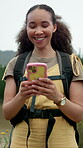 Outdoor, hiking and woman with phone for chat, laughing and communication with contact on adventure. Texting, online and African person with mobile for funny message, backpacking and laugh on holiday