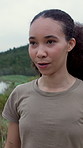 Woman, shake and exercise with warm up in nature, start workout or runner getting ready for health. Female person, sports or athlete with preparation, energy and running outdoor for fitness training
