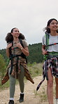 Backpacking, hiking and girl friends in nature with adventure, discovery or exploring on vacation. Happy, outdoor and female people trekking for travel with health, wellness or bonding on holiday.