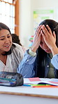 Stress, girl and teacher in classroom, comfort and studying with pressure, help and frustrated. People, student and woman in school, assessment and assistance for test, exam and nerves with anxiety