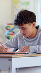 Education, student or writing in high school for lesson revision, exam preparation or scholarship. Development, teenager or learning with books in class for study notes, course info or academic essay