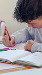 Education, writing and student with sticky note in high school for annotation, exam study and growth. Teenager, boy and textbook info in classroom for chapter summary, test preparation and learning