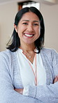 Happy woman, professor and face at college with arms crossed in classroom, confidence and education. Person, teacher or instructor with pride, portrait and ready for scholarship at campus in Peru