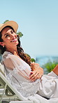 Resort, happy and face of woman with arms crossed outdoor for summer holiday, laughing or relax. Sunshine, mature person and unwind on deck chair at lodge for vacation break, travel adventure or joke