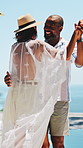 Dance, happy and couple outdoor at resort to celebrate marriage, anniversary and vacation together. Interracial, hotel and man with woman spin for bonding, love and relationship by pool for holiday