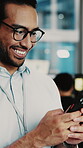 Businessman, phone and happy in office for research, article approval and deadline extension. Journalist, mobile and typing in agency for story update, info source and response for career opportunity