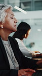 Typing, reading and woman with programming in office, server update and system maintenance planning. Software development, tech or mature person with solution for program glitch, debug test or coding